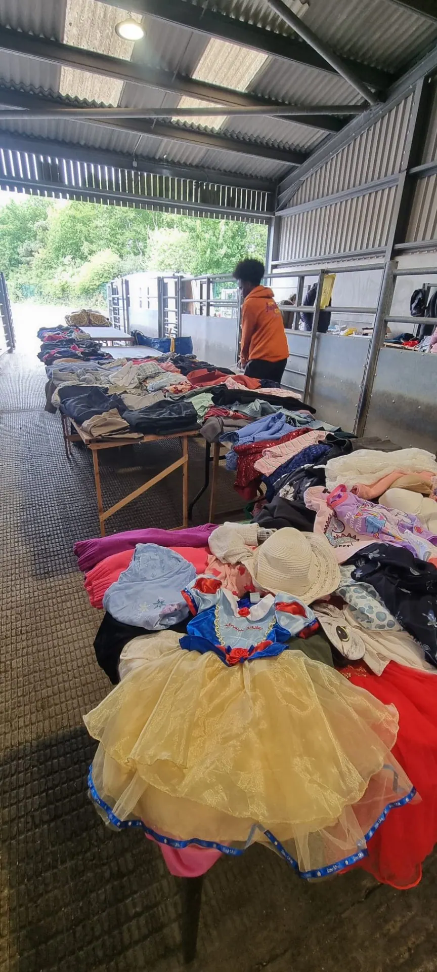 Clothing sorted for reuse at a community sale