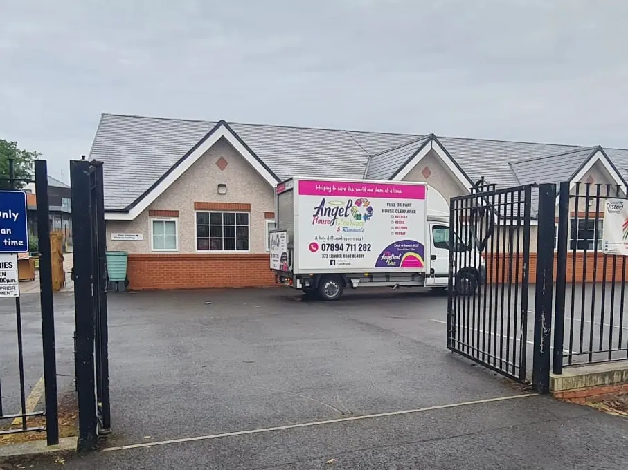 Angel House Clearance lorry at a clearance site