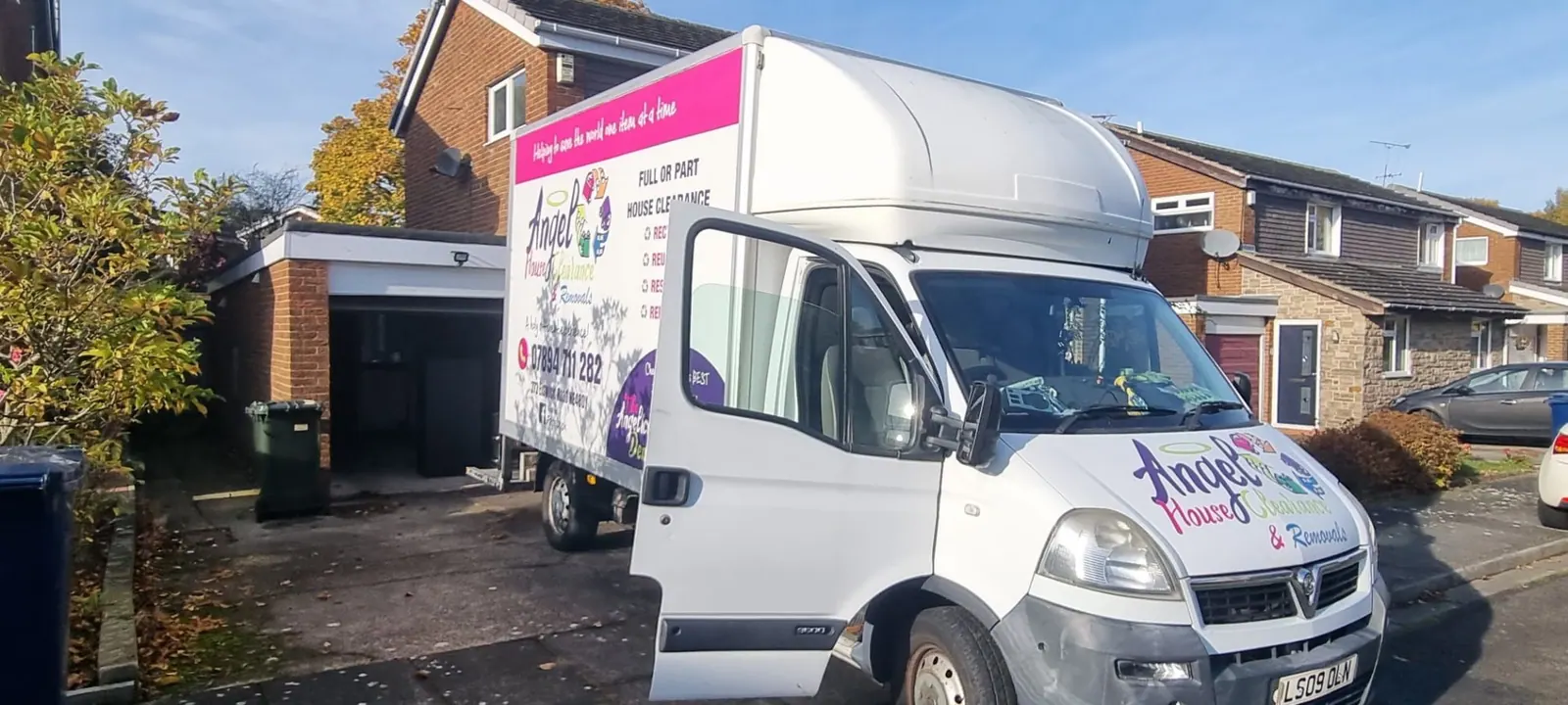 Angel House Clearance lorry on a driveway ready for clearance