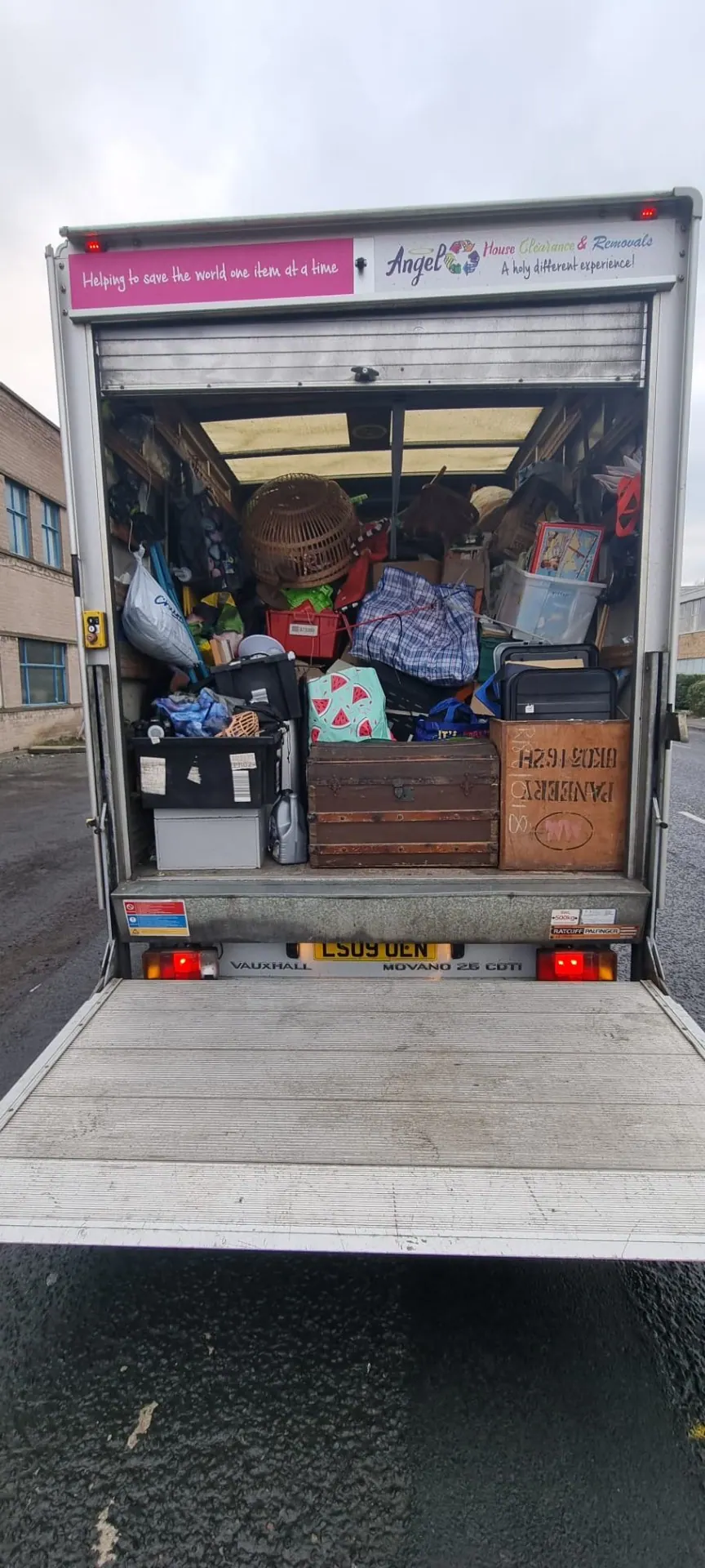 Lorry fully loaded with items from a house clearance
