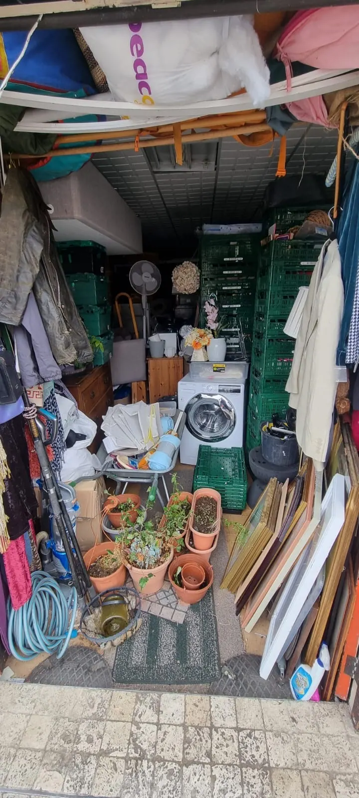 Storage area at The Angelical Den packed with reusable items