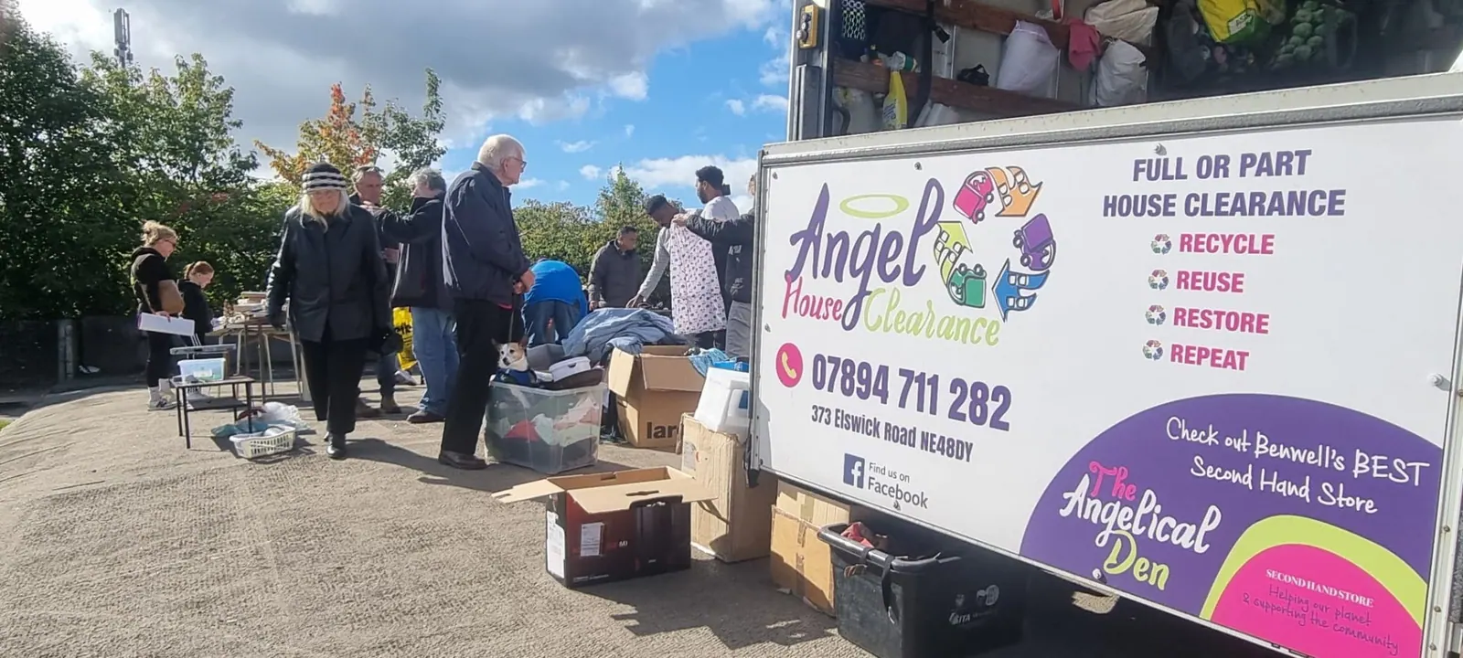 Angel House Clearance branded van at a car boot sale
