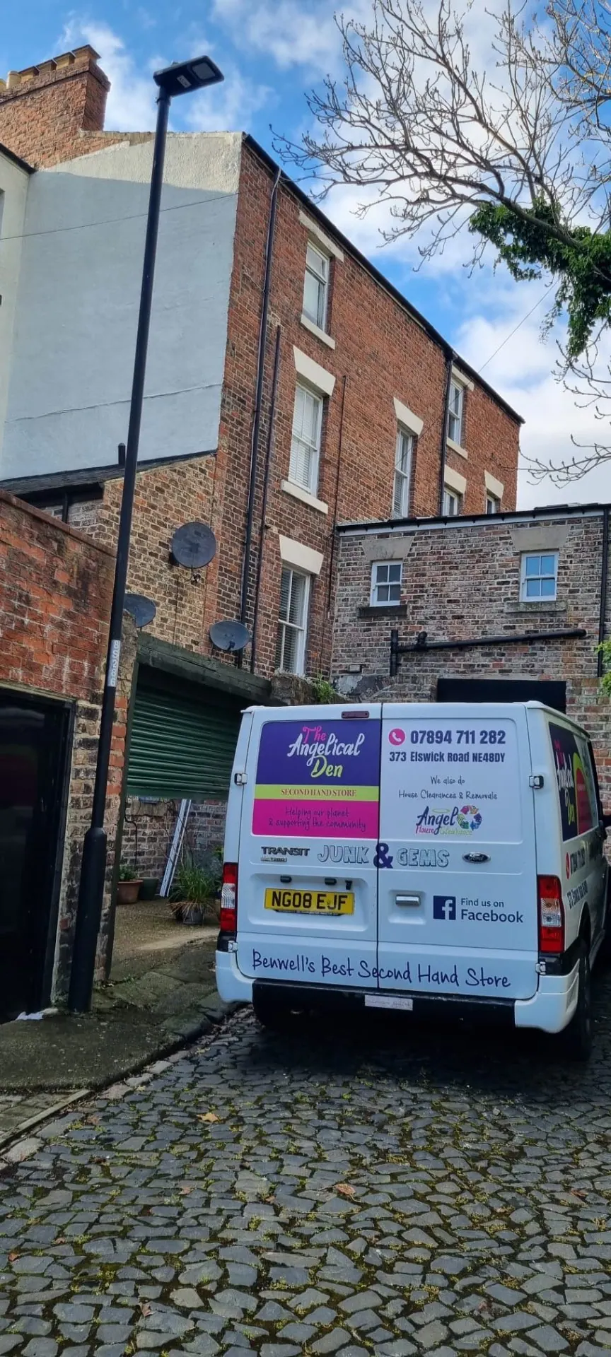 The Angelical Den branded van rear view