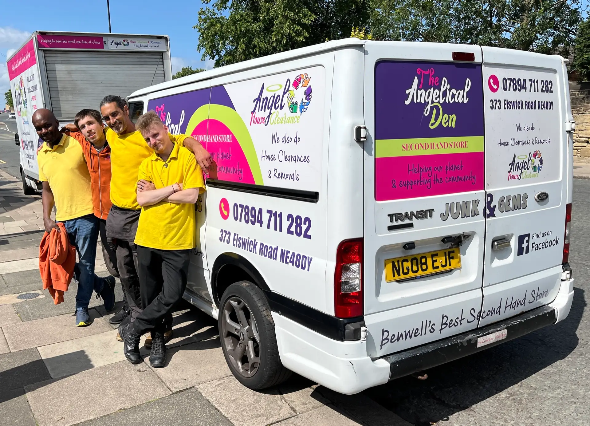staff stood by angel house clearance van in unfiform of yellow jumpers and t-shorts