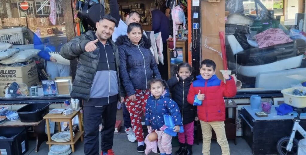A family outside the angelical den shop in newcastle
